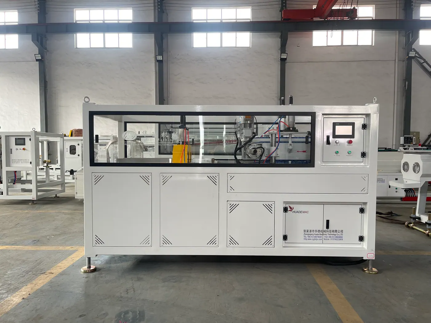 Haul-off and cutter unit for PVC pipe length control