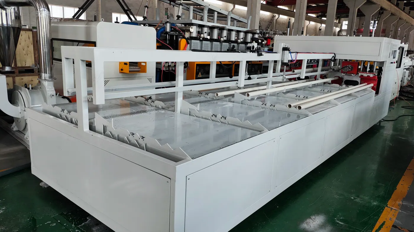 PVC pipe production line control and calibration section in the workshop