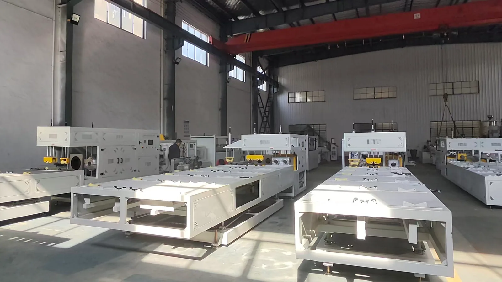 Multiple pipe belling machines prepared in factory workshop