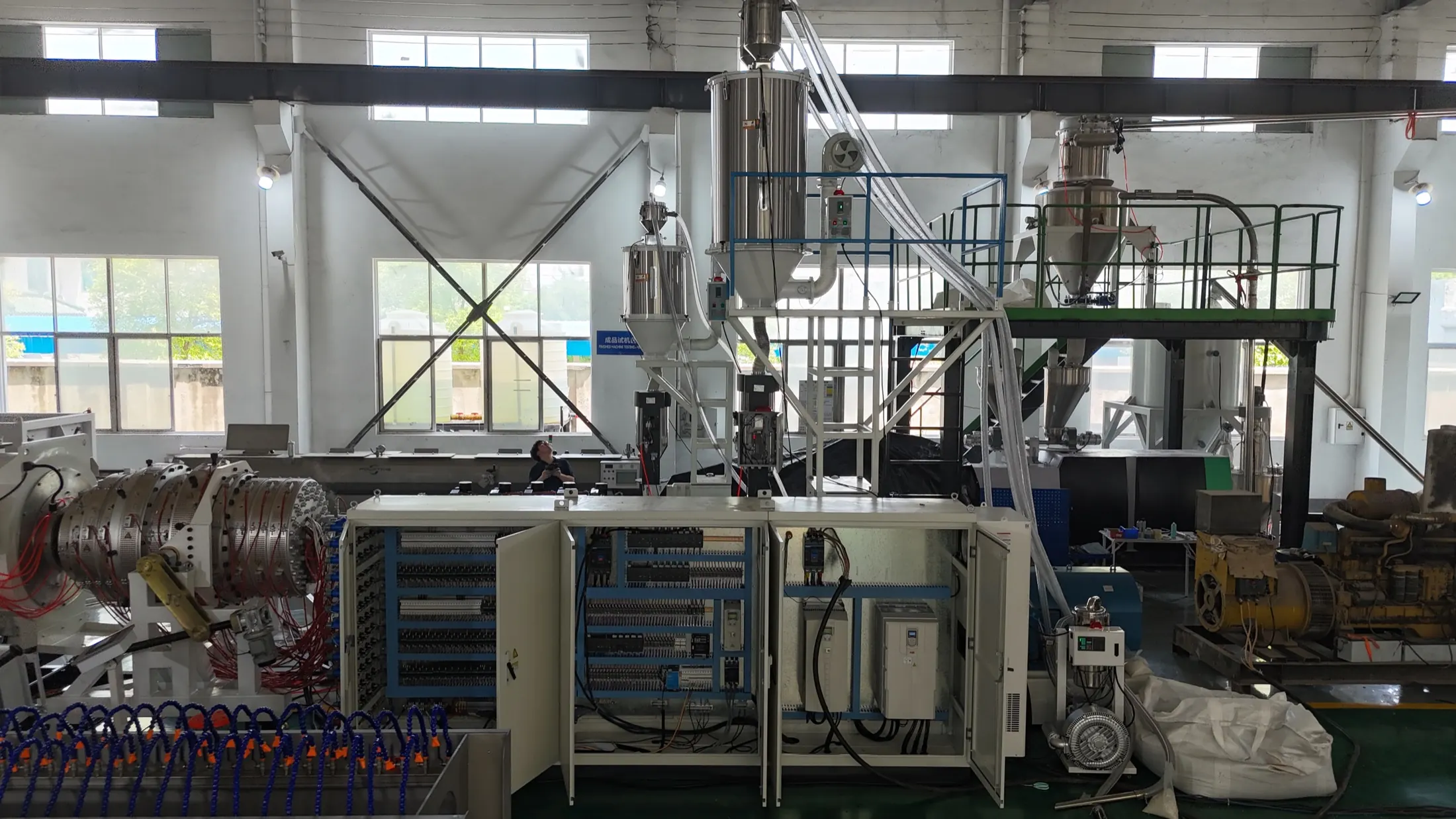 HDPE pipe extrusion line installed in the factory with feeding system and extruder