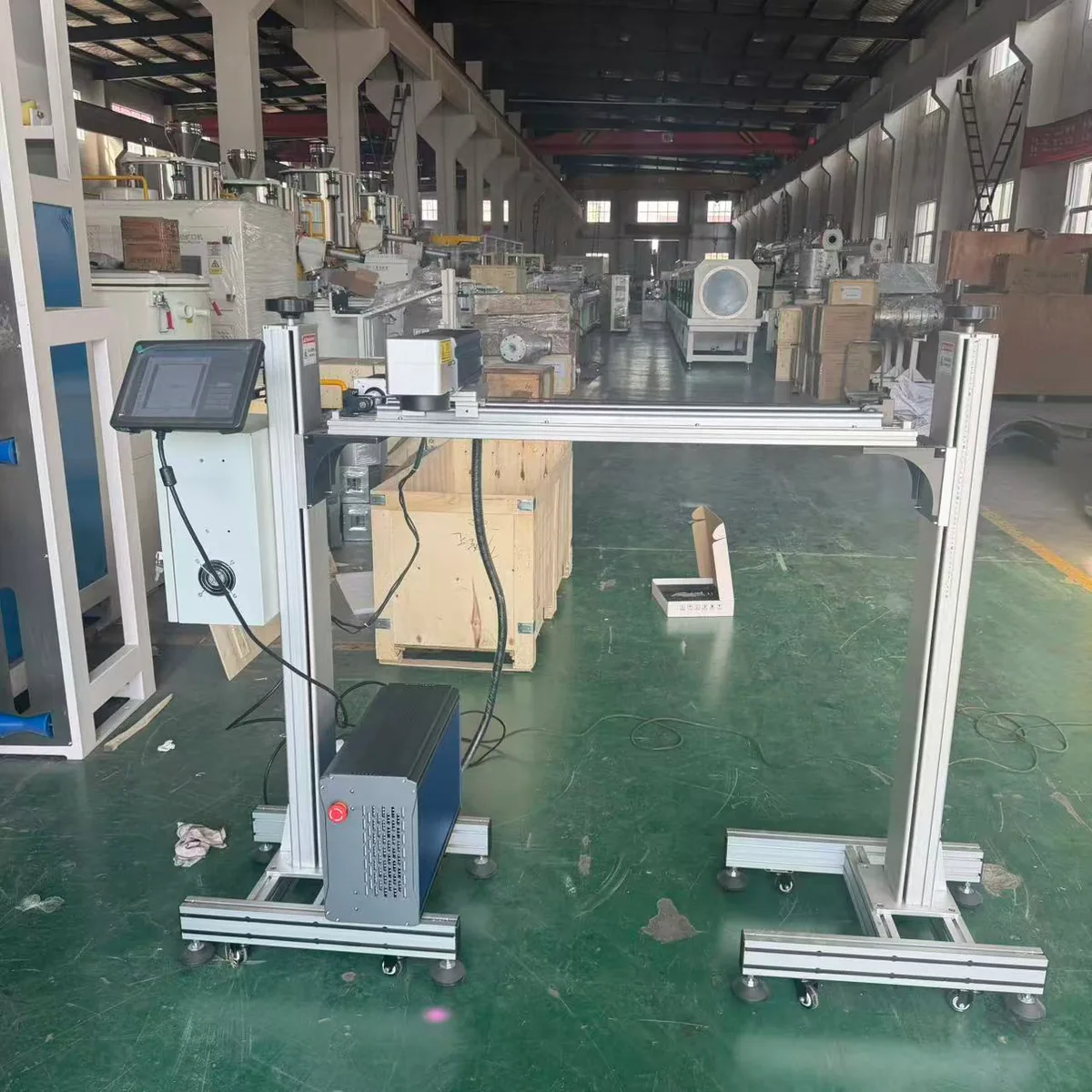 Fiber laser printer integrated with two-output pipe extrusion line