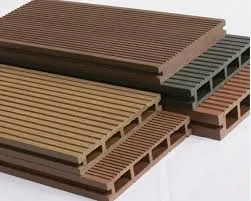 Stacked PE WPC decking profiles in brown and gray colors