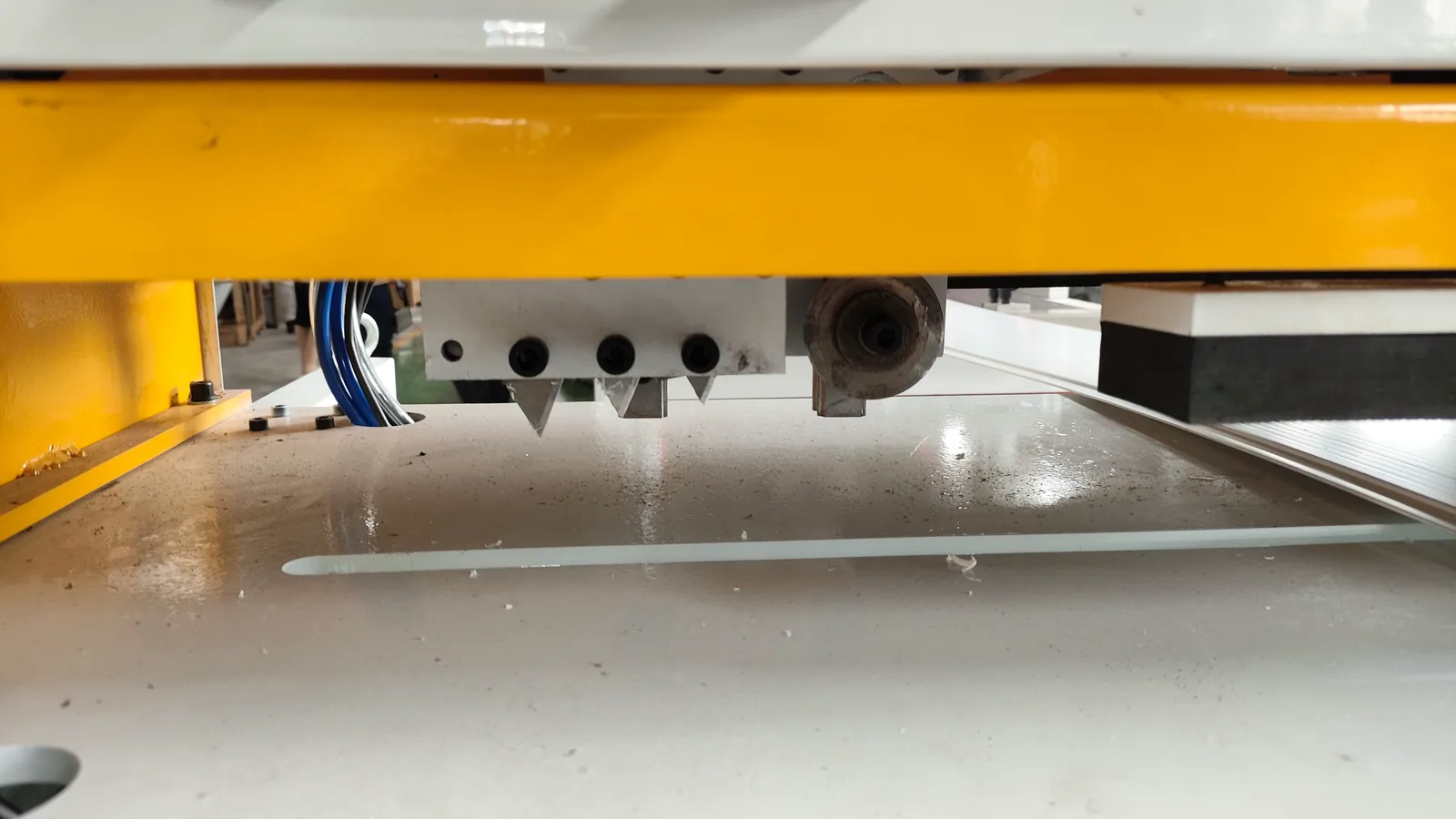 Cutter blade detail inside PVC ceiling panel cutting machine