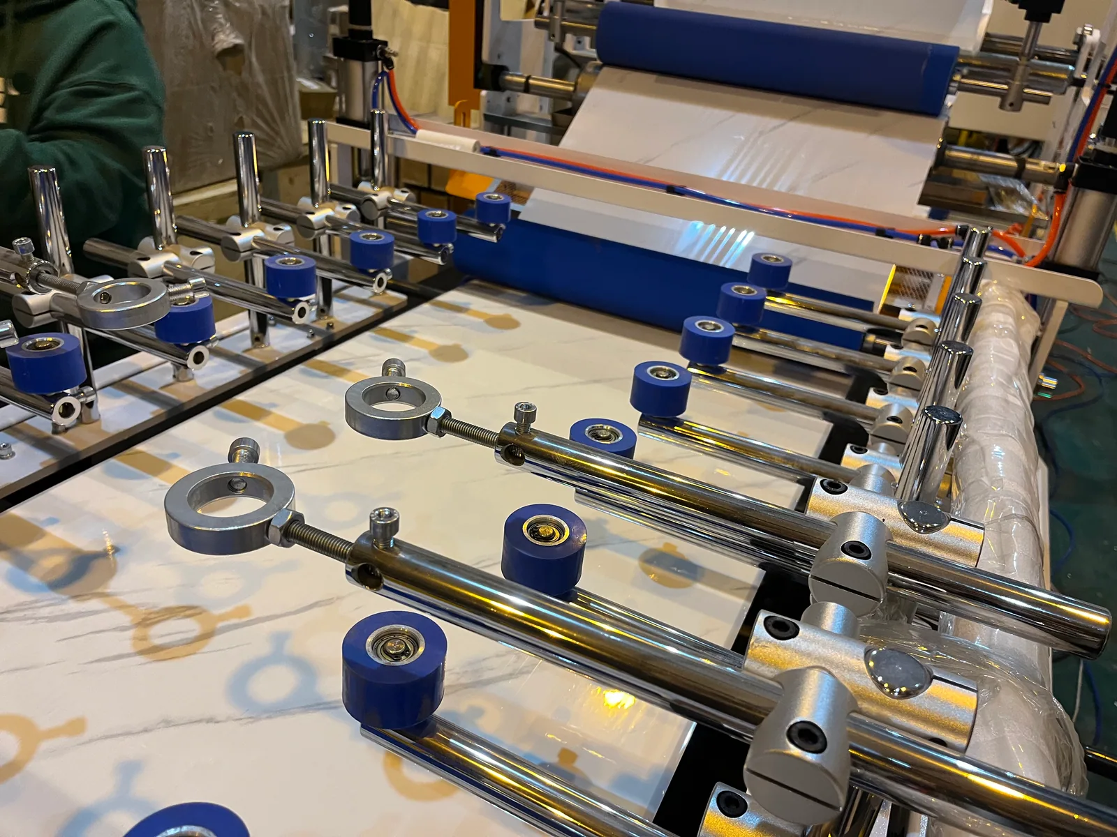Lamination roller detail for decorative PVC ceiling panel surface