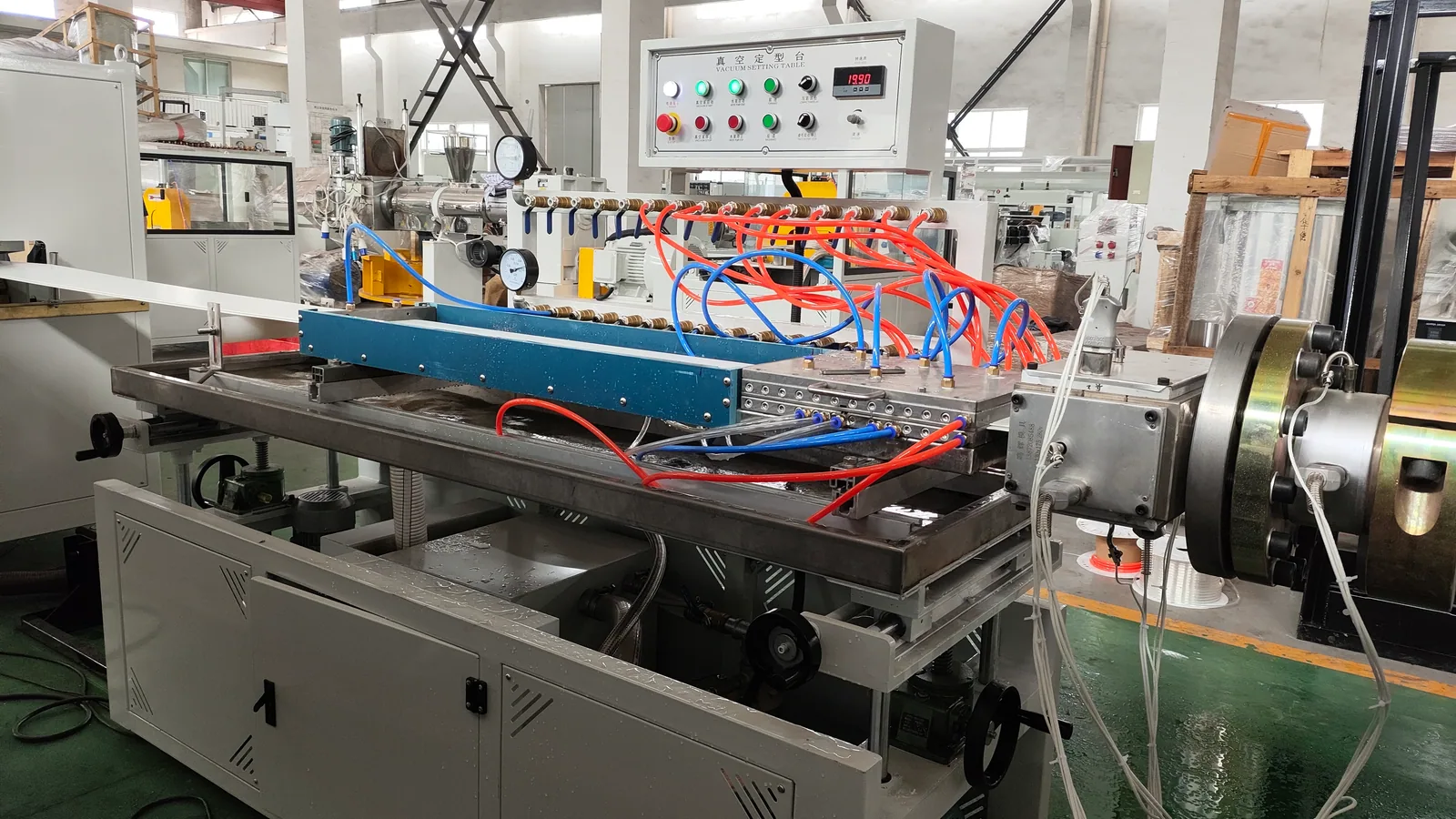 Vacuum calibration table for PVC ceiling panel shaping and cooling