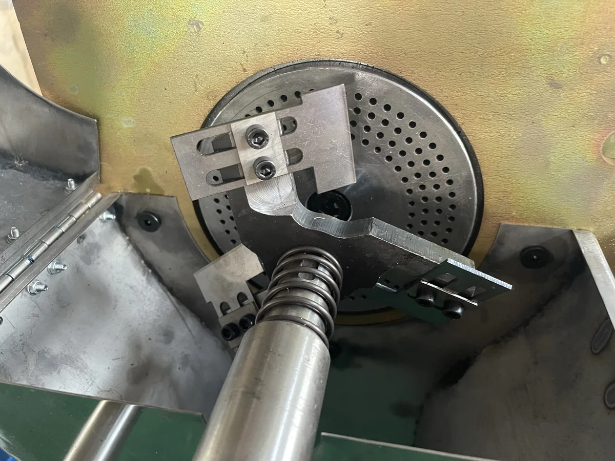 Close-up of die face hot-cut pelletizing head for PVC granules