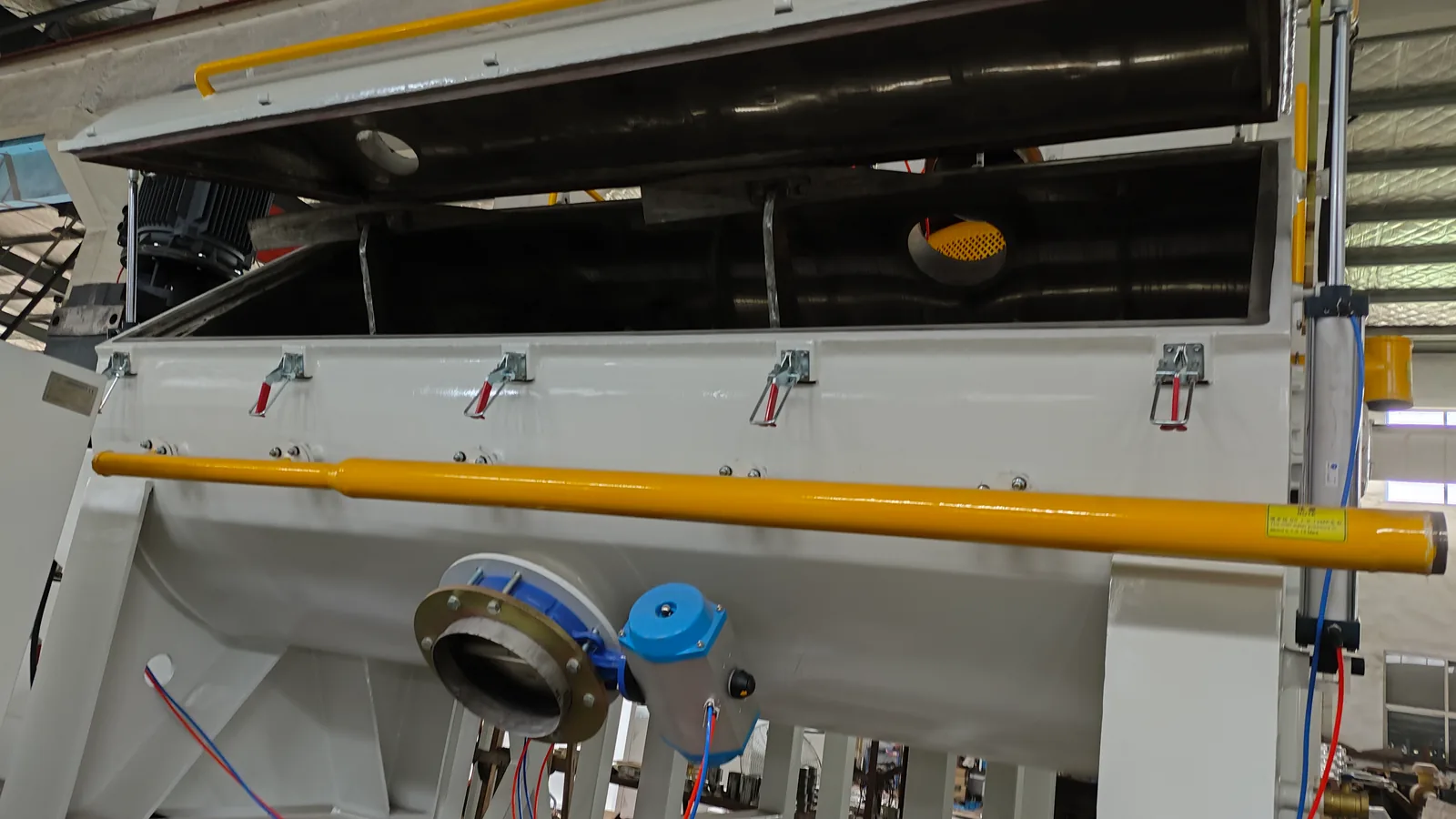 Open horizontal mixer chamber showing internal mixing structure