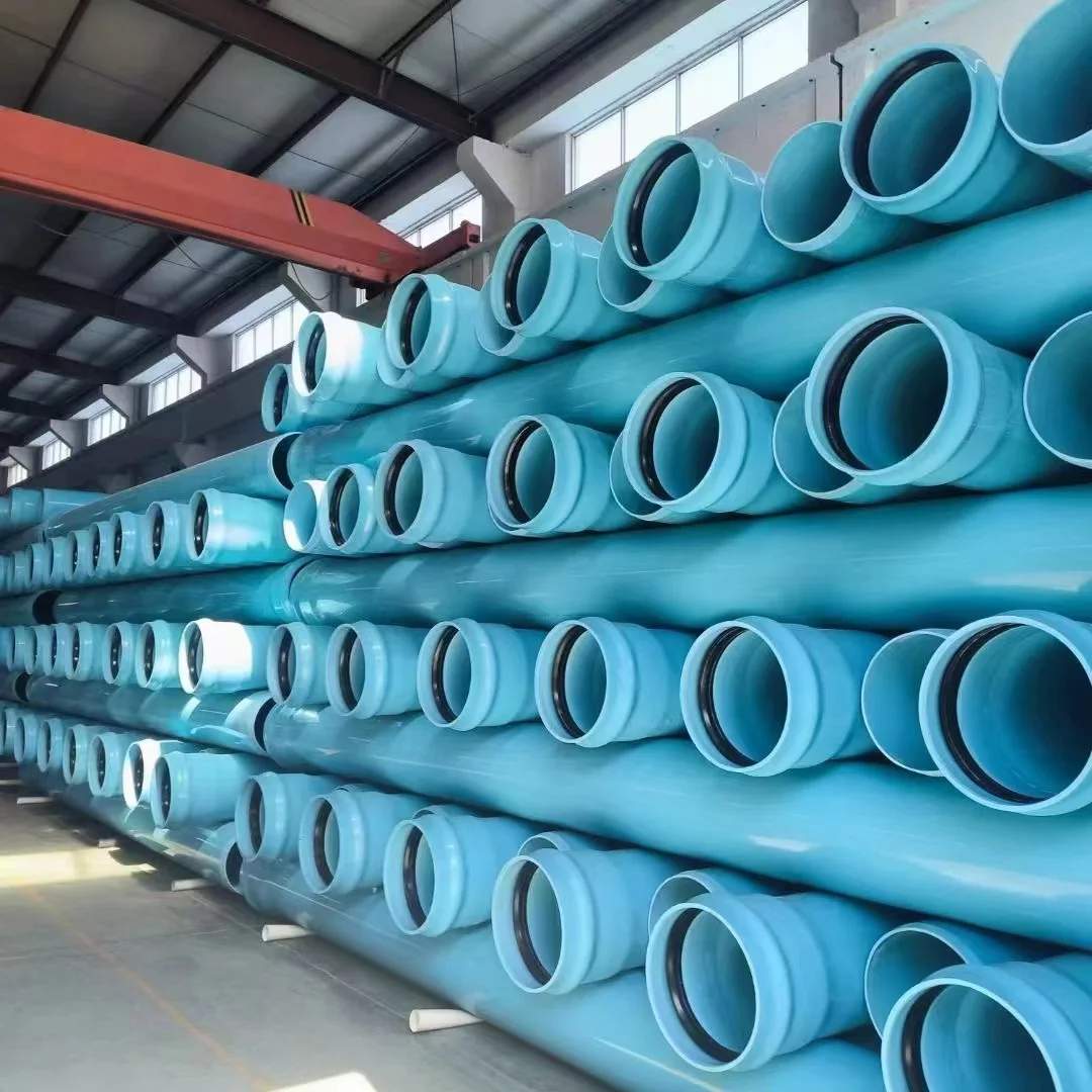 Blue belled PVC water pipes stacked in the workshop