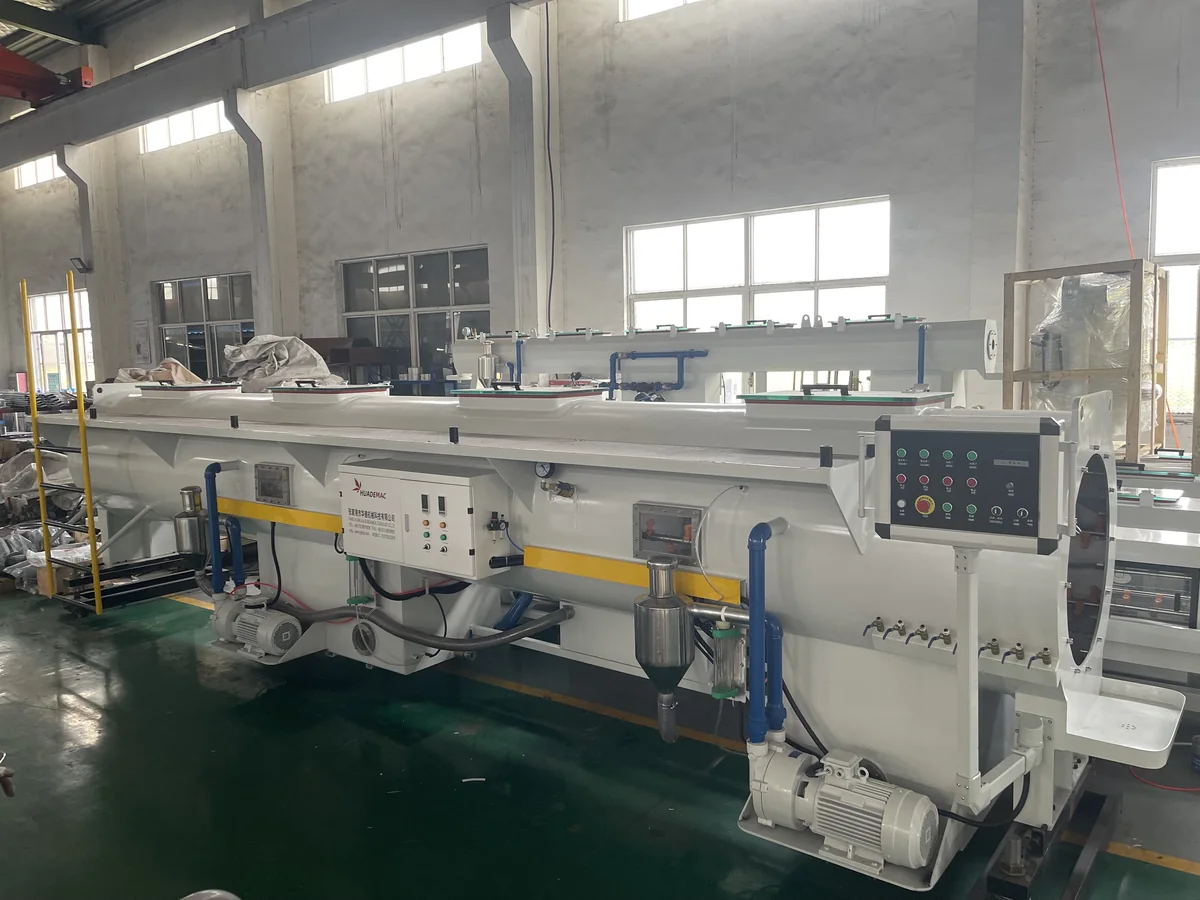 Vacuum calibration tank for PVC water pipe sizing and cooling