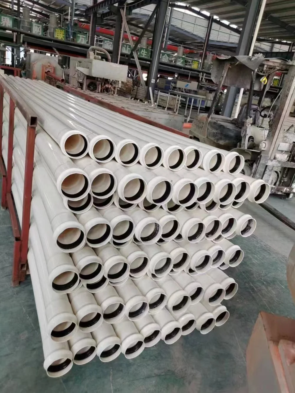 White belled PVC sewage pipes with rubber sealing rings