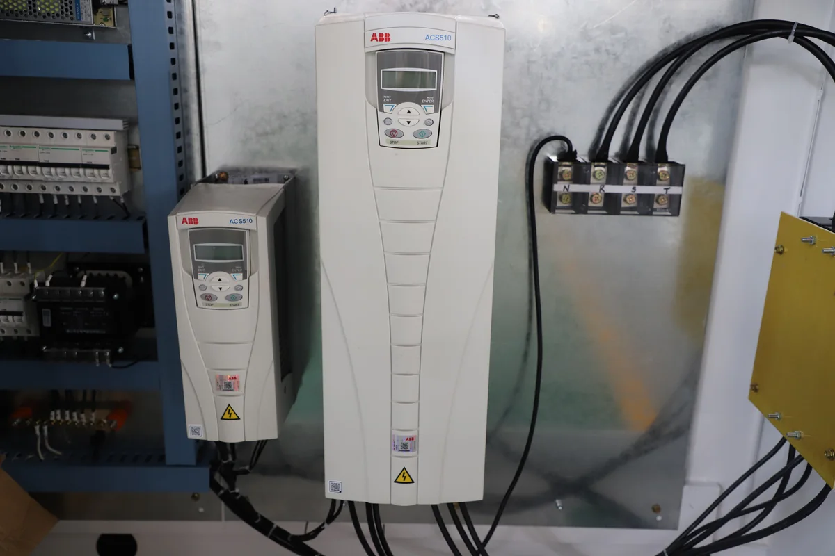 Inverter control system for twin screw extruder AC motor drive