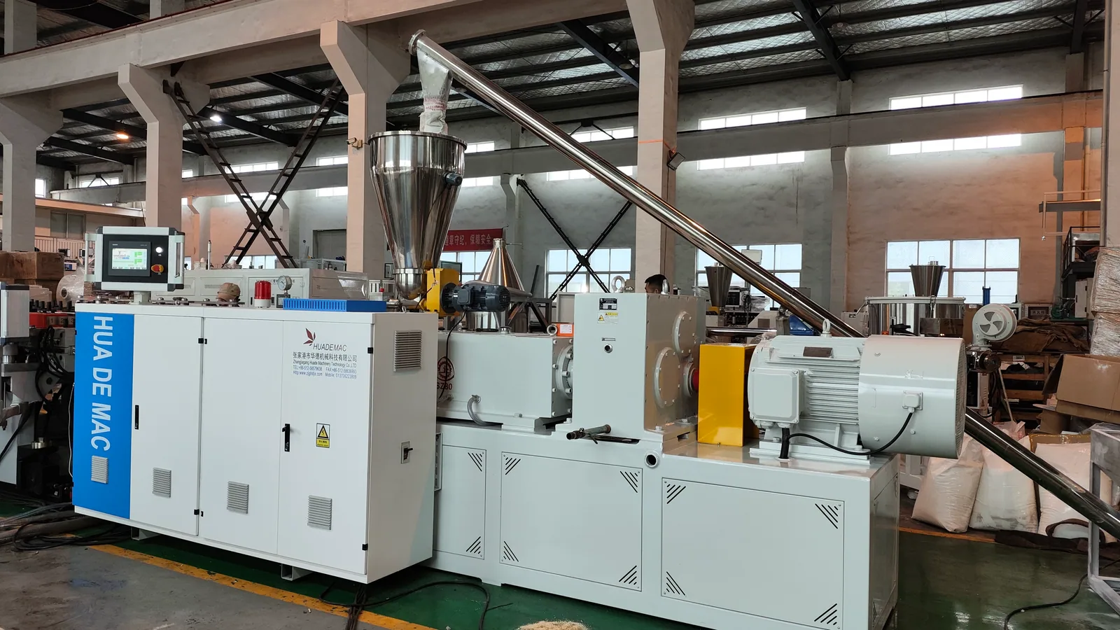 Side view of conical twin screw extruder for WPC PVC foam board production line