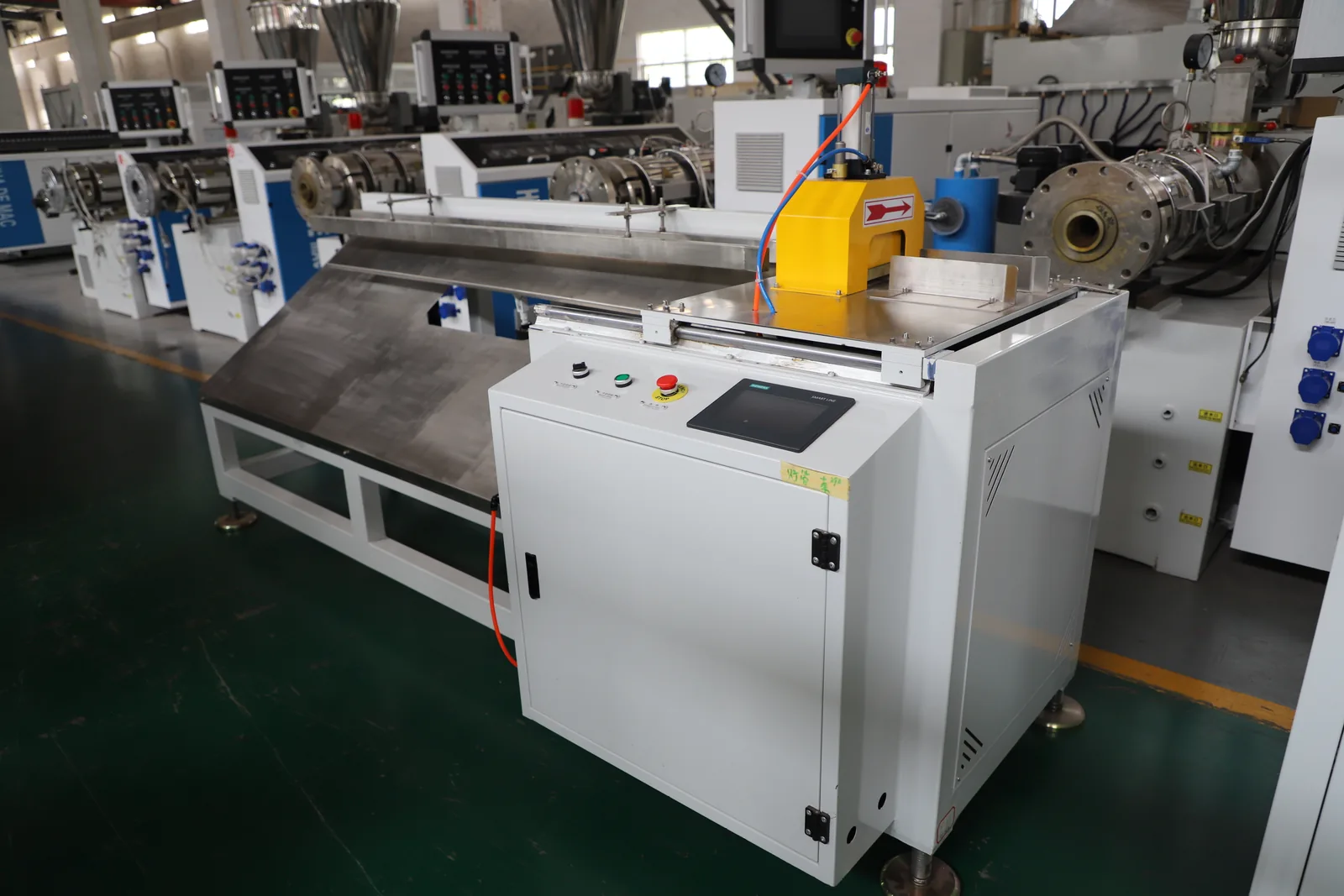 Dust free cutter and automatic stacker unit for LED tube production